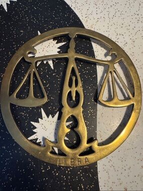 Vintage brass Libra trivet